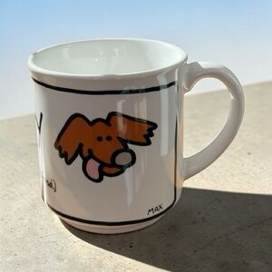 Humorous coffee mug that spells it out, (I heart my dog’s head) made in Japan